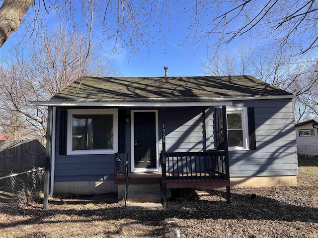 1926 E 17th St, Muncie, IN 47304 - view of front of property with a shingled roof and fence