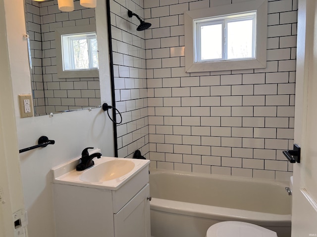 1926 E 17th St, Muncie, IN 47304 - full bathroom featuring vanity, shower / tub combination, and toilet