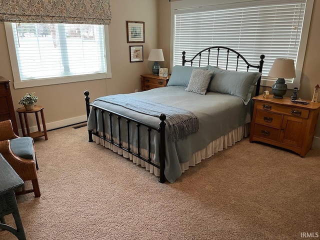 6425 E Wellston Dr, Bloomington, IN 47408 - bedroom with light colored carpet and baseboards