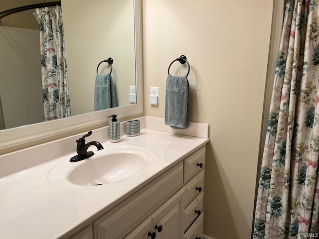 6425 E Wellston Dr, Bloomington, IN 47408 - bathroom with vanity and a shower with shower curtain