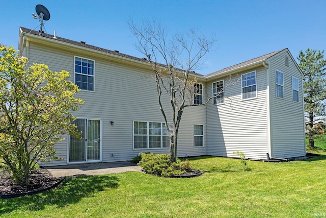 8928 Goshawk Ln, Fort Wayne, IN 46825 - rear view of house featuring a yard