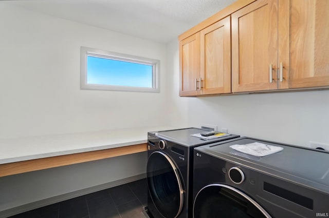 13222 Malfini Trl, Fort Wayne, IN 46845 - laundry room featuring cabinet space, washer and dryer, and dark tile patterned floors
