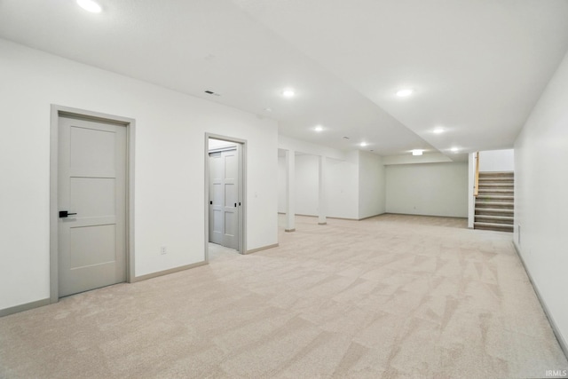 13222 Malfini Trl, Fort Wayne, IN 46845 - finished below grade area with light colored carpet, stairs, recessed lighting, and baseboards
