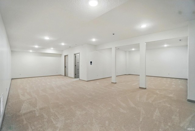 13222 Malfini Trl, Fort Wayne, IN 46845 - finished basement featuring light carpet, baseboards, and recessed lighting