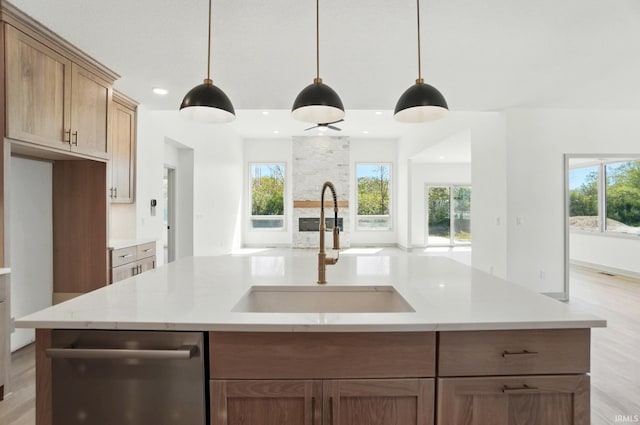 13222 Malfini Trl, Fort Wayne, IN 46845 - kitchen featuring a sink, recessed lighting, light wood-style flooring, dishwasher, and pendant lighting