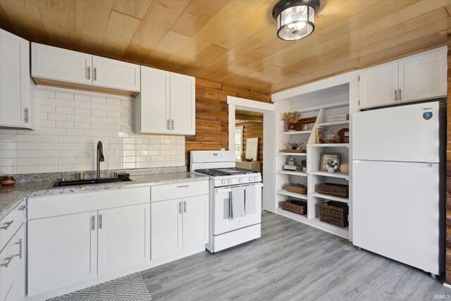 kitchen with white appliances, a sink, wooden ceiling, white cabinetry, and open shelves
