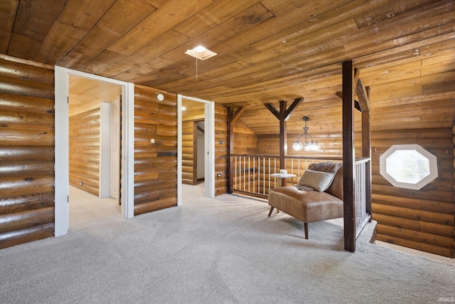 sitting room with rustic walls, wood ceiling, carpet floors, and stairway