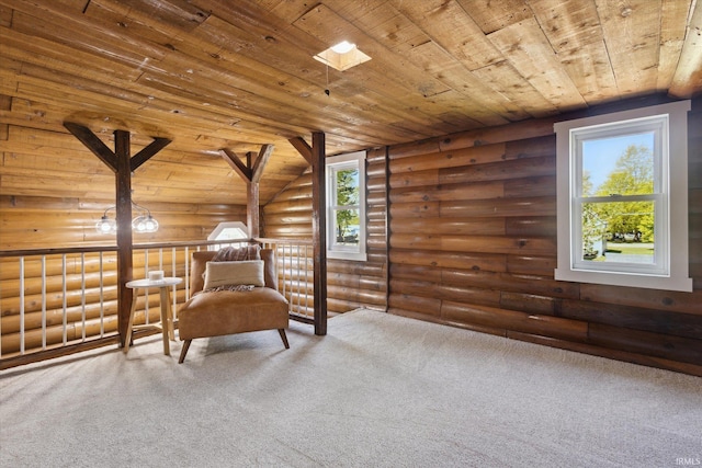 bedroom with log walls, wooden ceiling, and carpet floors