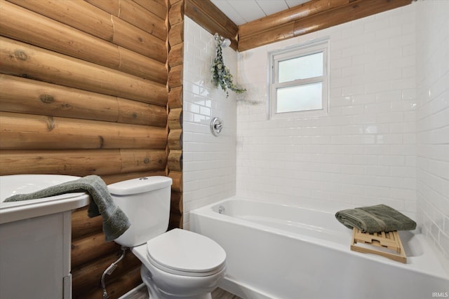 full bathroom featuring log walls, toilet, shower / bath combination, and vanity