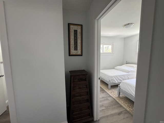 hallway with wood finished floors