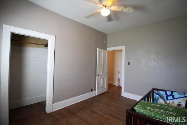 128 E Washington St, Williamsport, IN 47993 - bedroom featuring wood finished floors, baseboards, and ceiling fan