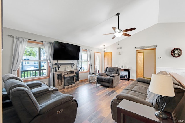 706 Taylor Ln, Albion, IN 46701 - living room with plenty of natural light, a ceiling fan, wood finished floors, a fireplace, and high vaulted ceiling