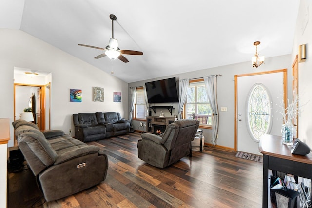 706 Taylor Ln, Albion, IN 46701 - living area featuring lofted ceiling, a ceiling fan, a warm lit fireplace, dark wood-style floors, and baseboards