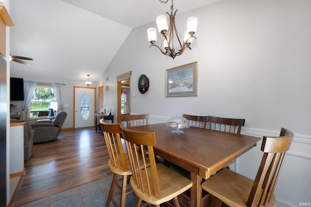 706 Taylor Ln, Albion, IN 46701 - dining area featuring a chandelier, lofted ceiling, a ceiling fan, and dark tile patterned floors