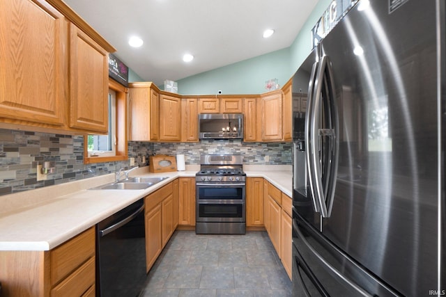 706 Taylor Ln, Albion, IN 46701 - kitchen featuring appliances with stainless steel finishes, a sink, backsplash, light countertops, and lofted ceiling