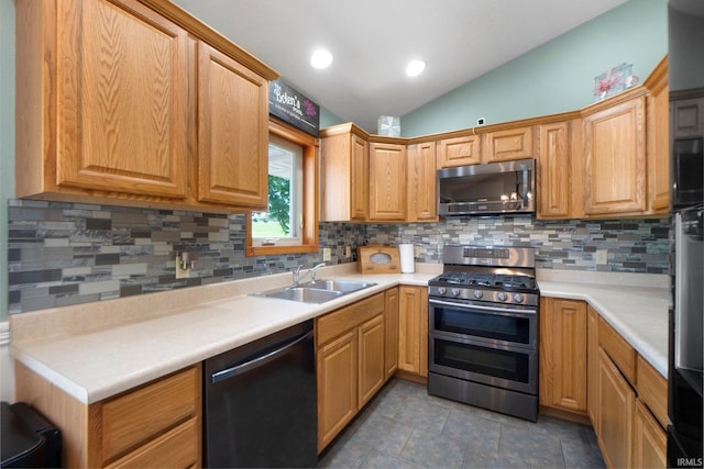 706 Taylor Ln, Albion, IN 46701 - kitchen featuring stainless steel appliances, a sink, lofted ceiling, decorative backsplash, and light countertops