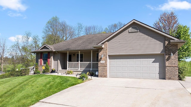 706 Taylor Ln, Albion, IN 46701 - single story home featuring covered porch, a garage, driveway, and brick siding