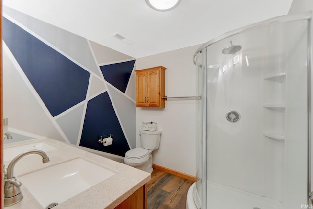 706 Taylor Ln, Albion, IN 46701 - full bath featuring a sink, a stall shower, wood finished floors, toilet, and baseboards