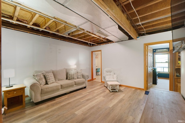 706 Taylor Ln, Albion, IN 46701 - living room with light wood-type flooring and baseboards