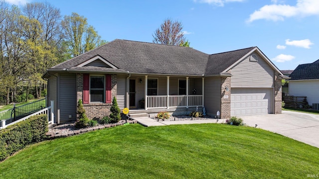 706 Taylor Ln, Albion, IN 46701 - view of front facade featuring brick siding, covered porch, driveway, an attached garage, and roof with shingles