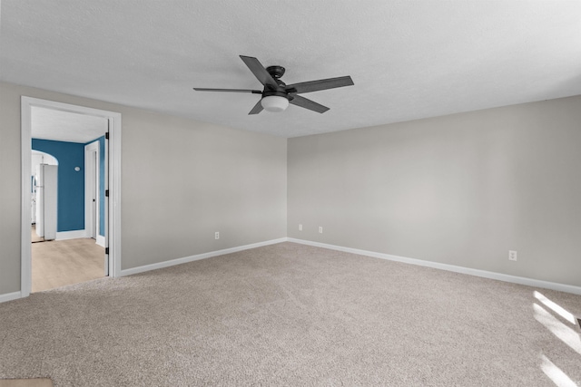 1508 E Hoffer St, Kokomo, IN 46902 - empty room with light colored carpet, ceiling fan, and baseboards