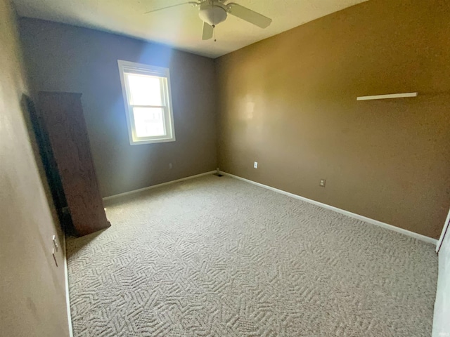 1108 Silver Springs Ct, Fort Wayne, IN 46825 - empty room with carpet flooring, ceiling fan, and baseboards