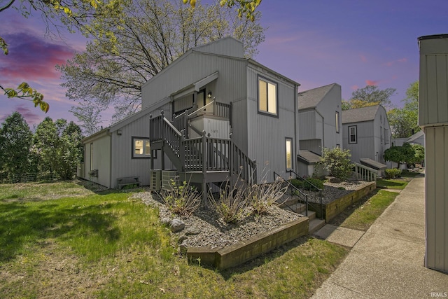 53455 Stoneridge St Unit C, South Bend, IN 46637 - view of front of home featuring stairway and a front yard