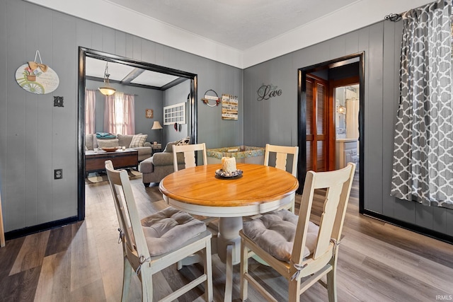 47 E Center St, Williamsport, IN 47993 - dining room with wood finished floors and a decorative wall