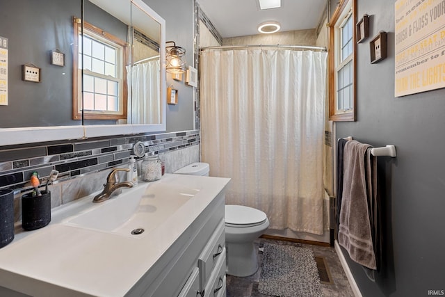 47 E Center St, Williamsport, IN 47993 - bathroom with plenty of natural light, toilet, vanity, and shower / tub combo