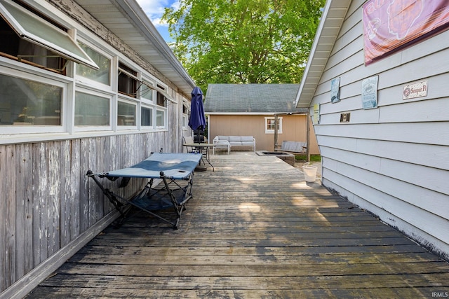 47 E Center St, Williamsport, IN 47993 - wooden deck featuring an outdoor living space