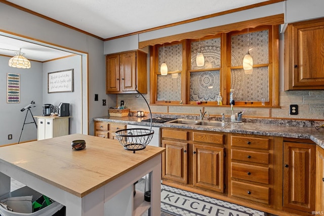 47 E Center St, Williamsport, IN 47993 - kitchen with a sink, tasteful backsplash, brown cabinetry, crown molding, and dishwasher