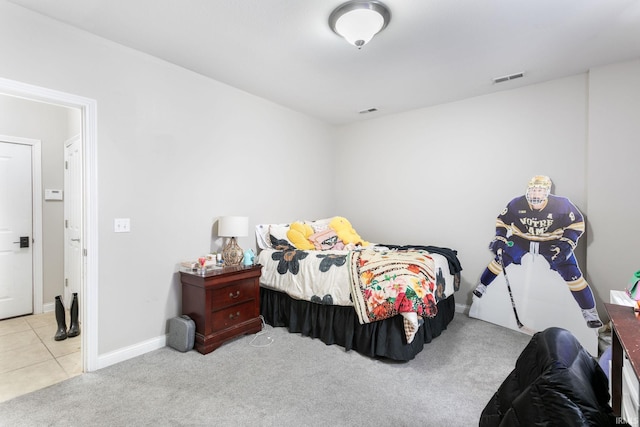 carpeted bedroom with baseboards
