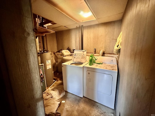 2796 Alexandria Ct, Lafayette, IN 47909 - laundry room featuring washing machine and dryer, water heater, and wooden walls