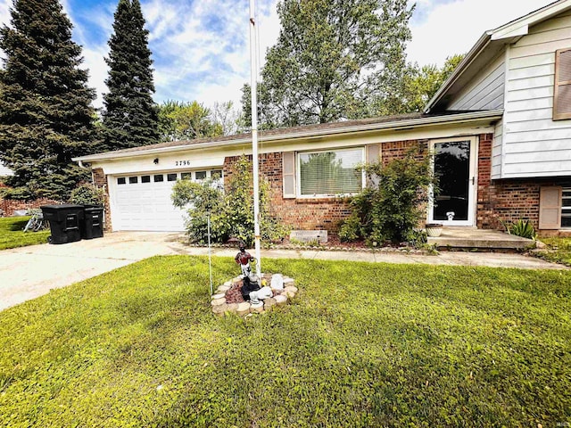 2796 Alexandria Ct, Lafayette, IN 47909 - split level home featuring brick siding, driveway, an attached garage, and a front yard