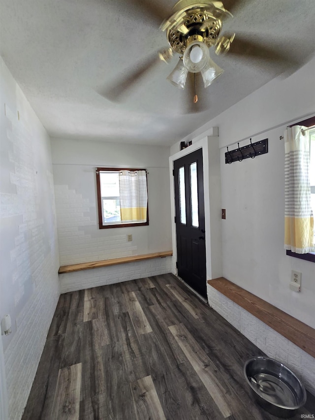 304 N Main St, South Whitley, IN 46787 - foyer entrance with ceiling fan and dark wood-type flooring