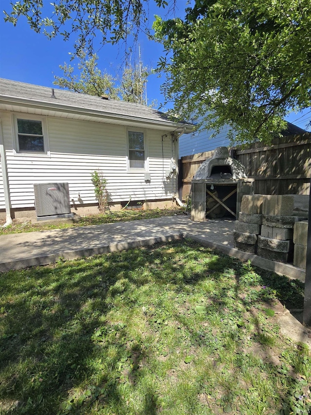 304 N Main St, South Whitley, IN 46787 - back of property with central AC unit