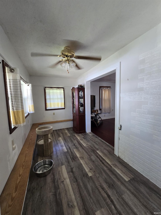 304 N Main St, South Whitley, IN 46787 - unfurnished room with wood finished floors and a ceiling fan