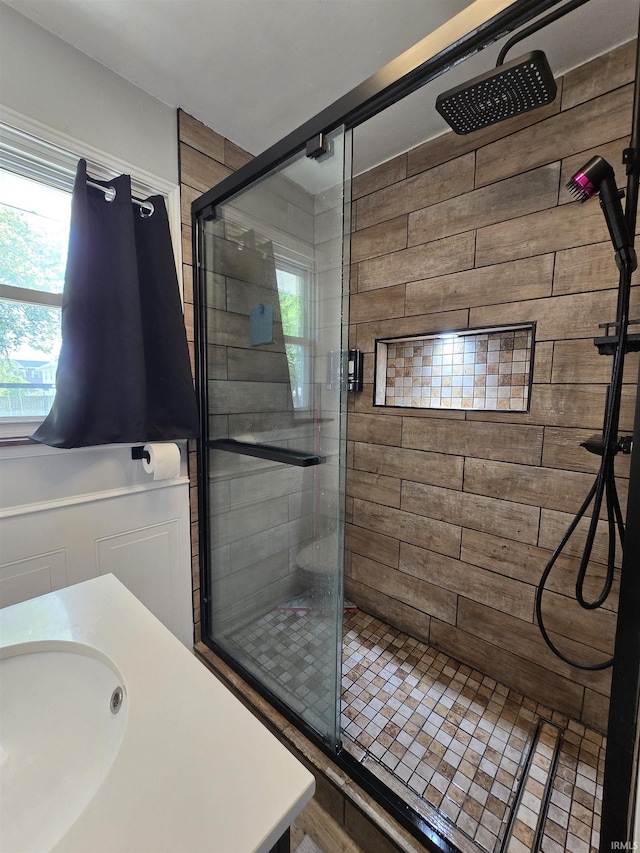 304 N Main St, South Whitley, IN 46787 - bathroom featuring a shower stall and a sink