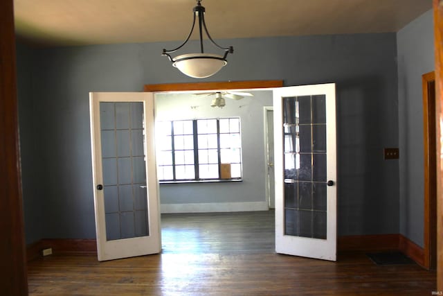 404 S Peters St, Garrett, IN 46738 - spare room with french doors, baseboards, wood finished floors, and ceiling fan
