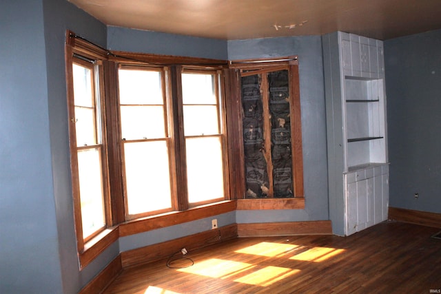 404 S Peters St, Garrett, IN 46738 - unfurnished room with wood finished floors and baseboards