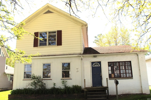 404 S Peters St, Garrett, IN 46738 - view of front of house featuring board and batten siding