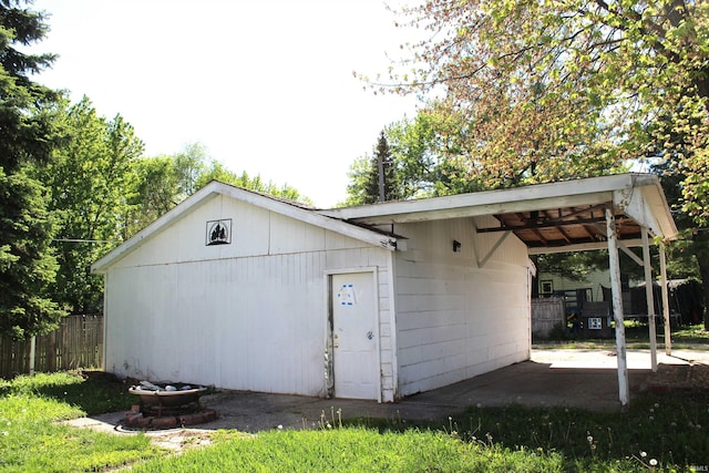 404 S Peters St, Garrett, IN 46738 - view of outbuilding featuring fence