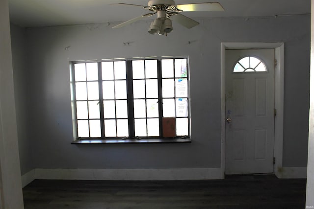 404 S Peters St, Garrett, IN 46738 - foyer entrance featuring wood finished floors, ceiling fan, and baseboards