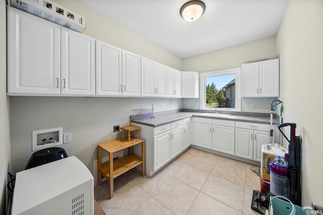 51025 Bellcrest Cir, Granger, IN 46530 - kitchen featuring white cabinets, a sink, and light tile patterned flooring