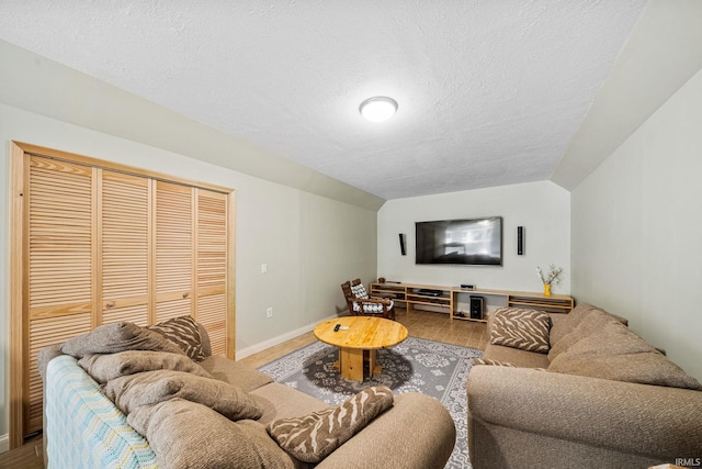 51025 Bellcrest Cir, Granger, IN 46530 - living area with a textured ceiling, baseboards, and wood finished floors