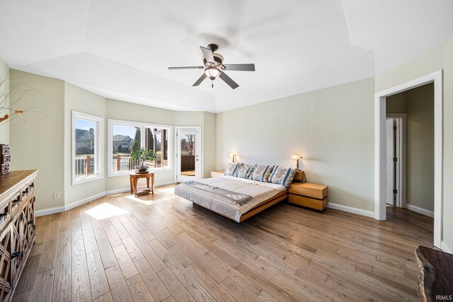 51025 Bellcrest Cir, Granger, IN 46530 - bedroom featuring wood-type flooring, baseboards, and a ceiling fan