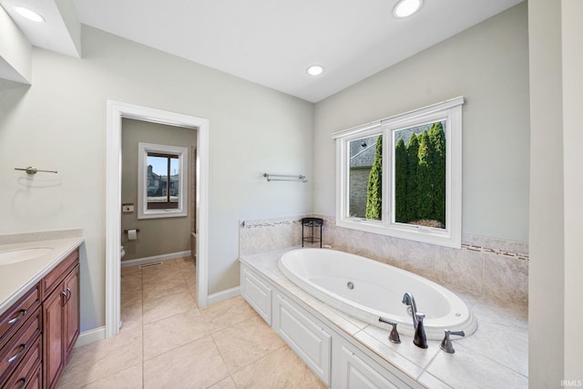 51025 Bellcrest Cir, Granger, IN 46530 - bathroom with a garden tub, toilet, vanity, recessed lighting, and tile patterned flooring
