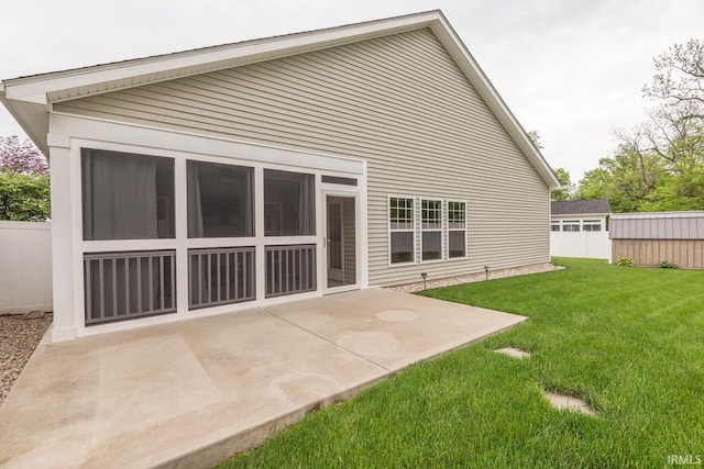 rear view of property featuring a patio