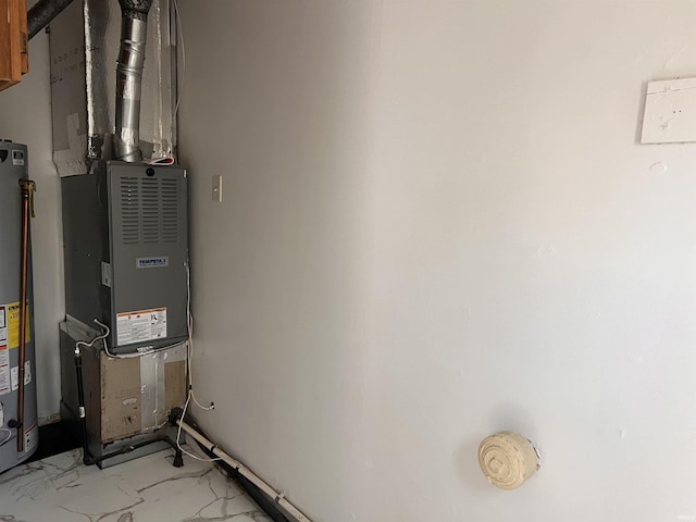 2211 E 19th St, Muncie, IN 47302 - utility room with heating unit and gas water heater