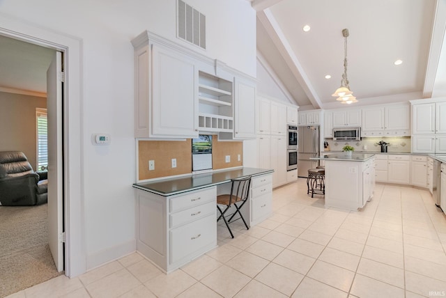 119 Highland Dr, Wabash, IN 46992 - kitchen with a kitchen bar, stainless steel appliances, tasteful backsplash, open shelves, and dark countertops